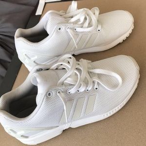 All white ZX Flux adidas shoe